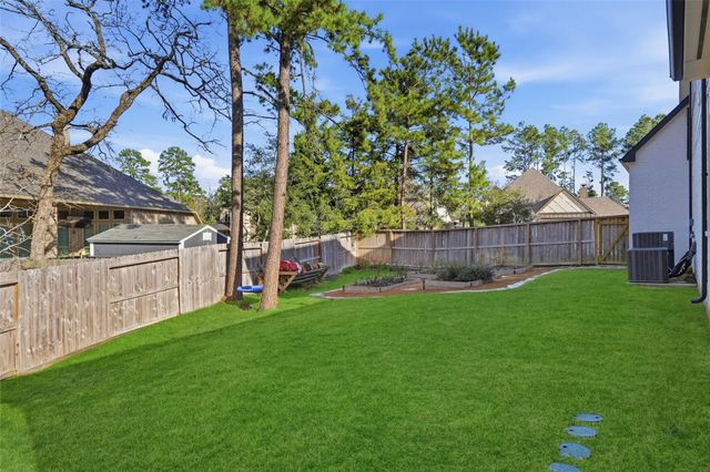 318 Calmato Woods Way, Willis, TX 77318