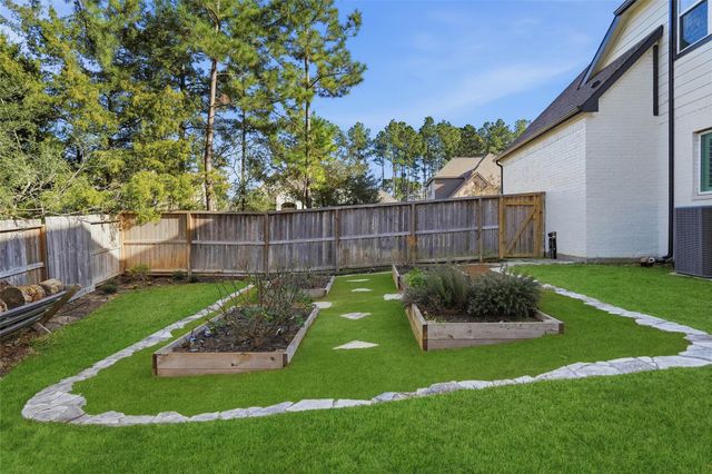 318 Calmato Woods Way, Willis, TX 77318