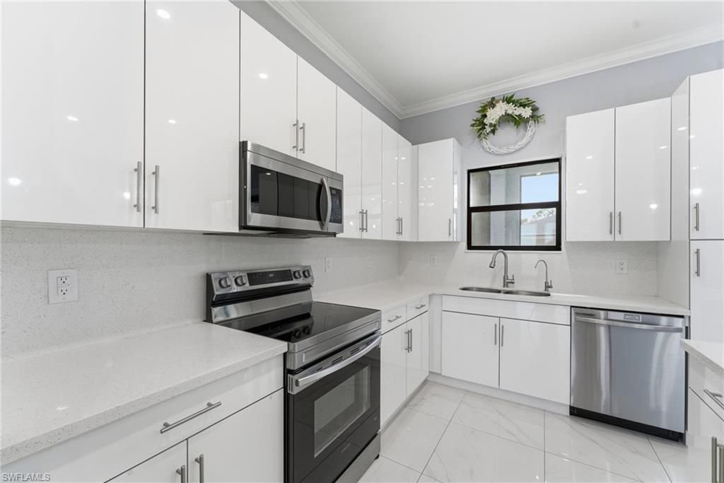 816 Bell BLVD S, LEHIGH ACRES, FL 33974 — photo 2