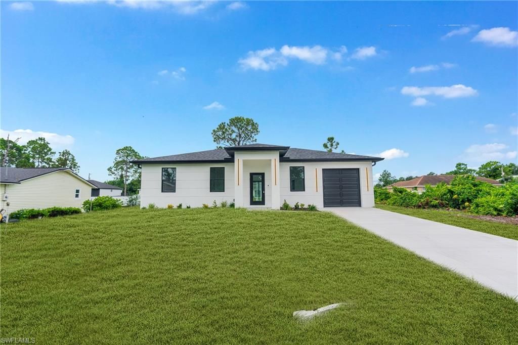 2807 6th ST SW, LEHIGH ACRES, FL 33976 — photo 2