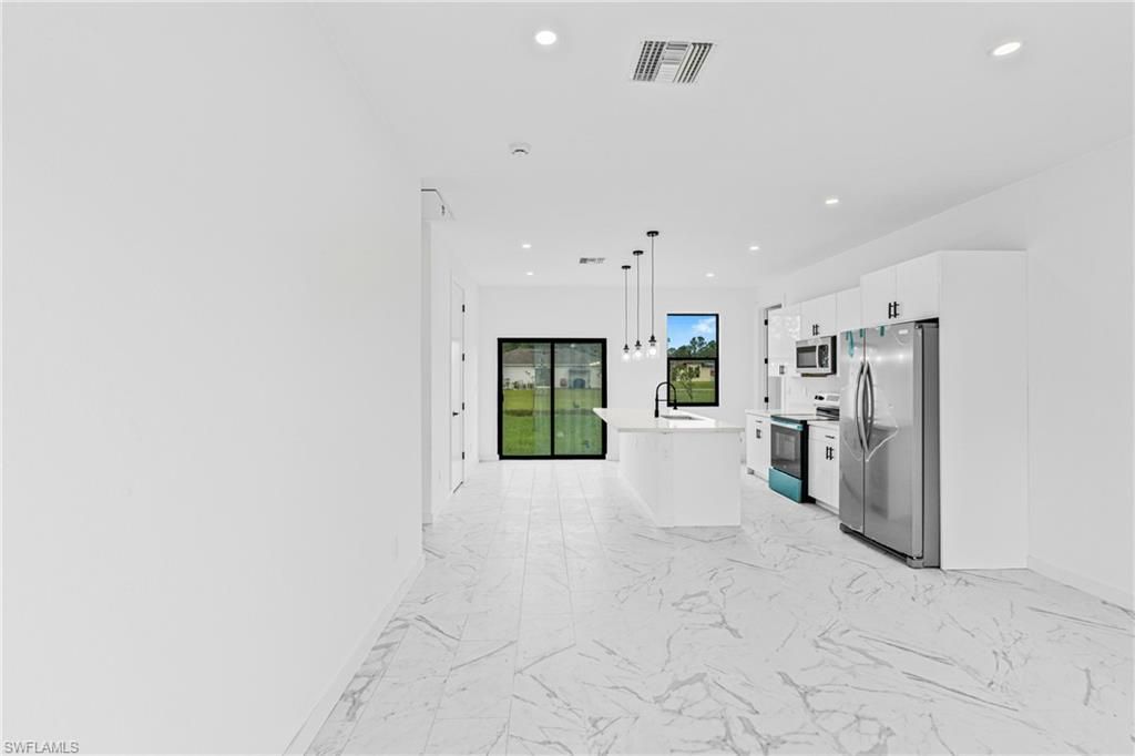 2807 6th ST SW, LEHIGH ACRES, FL 33976 — photo 4