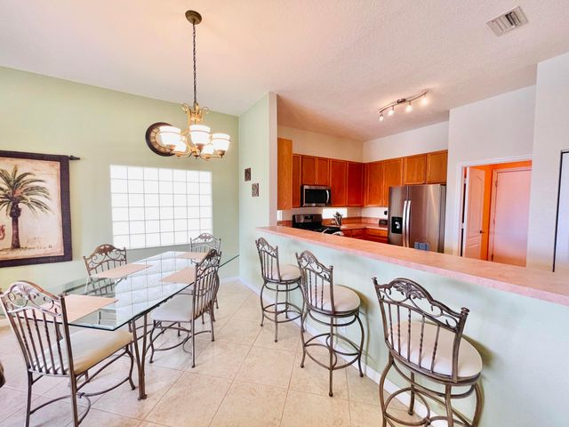 137 Canterbury Place, Royal Palm Beach, FL 33414