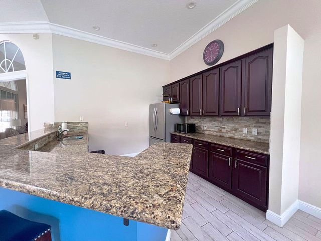 137 Canterbury Place, Royal Palm Beach, FL 33414