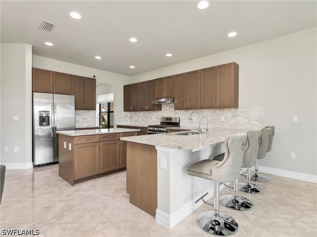 4716 Kensington CIR, Naples, FL 34119