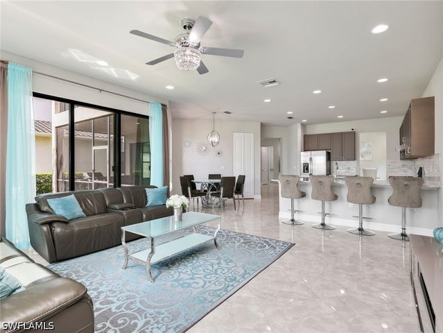 4716 Kensington CIR, Naples, FL 34119