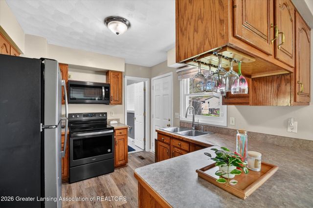 411 Green Meadows Drive, Lansing, MI 48917