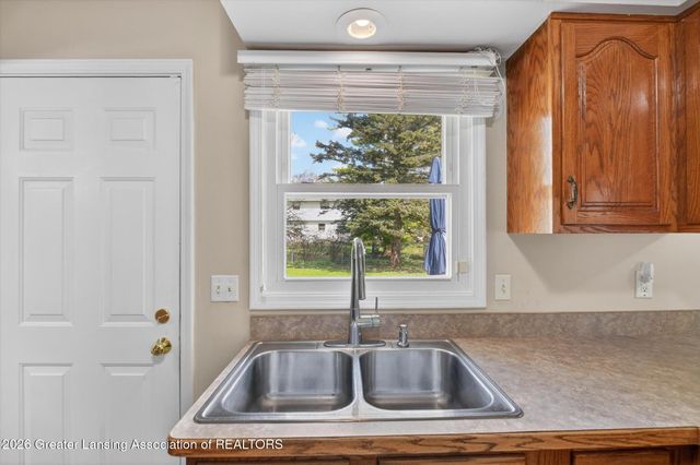 411 Green Meadows Drive, Lansing, MI 48917