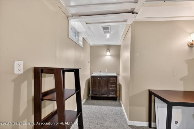 411 Green Meadows Drive, Lansing, MI 48917