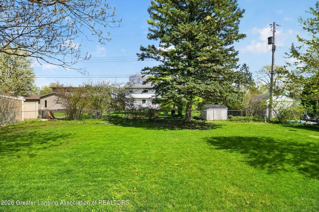 411 Green Meadows Drive, Lansing, MI 48917