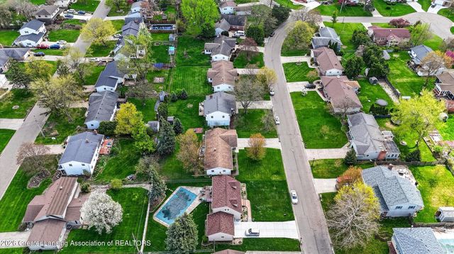411 Green Meadows Drive, Lansing, MI 48917