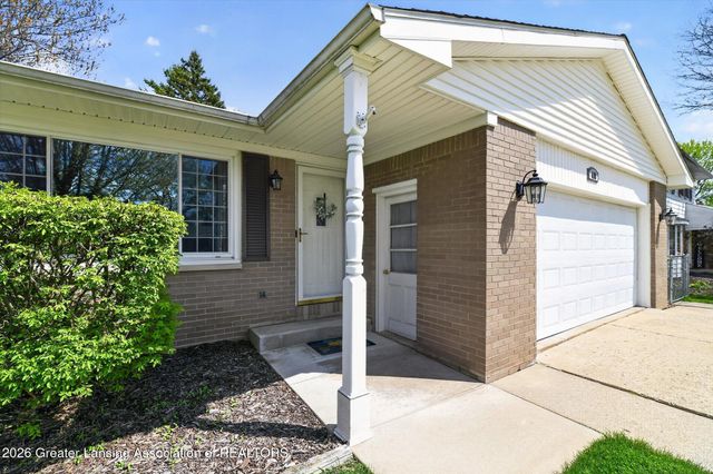 411 Green Meadows Drive, Lansing, MI 48917