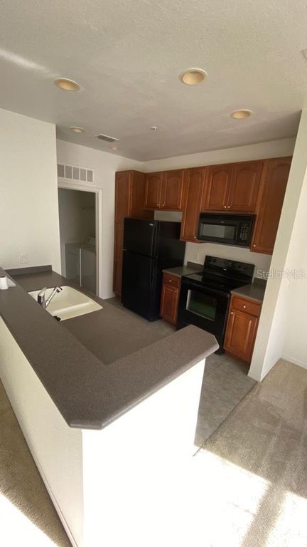 Image 7 of property listing at 2532 GRAND CENTRAL PARKWAY 3, Orlando, FL 32839