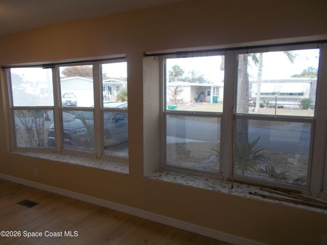 932 Cashew Circle W, Barefoot Bay, FL 32976