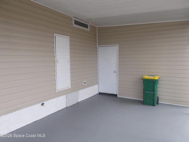 932 Cashew Circle W, Barefoot Bay, FL 32976