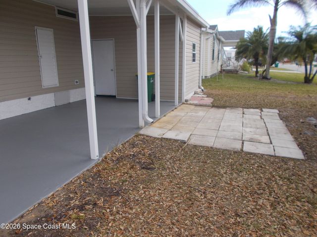 932 Cashew Circle W, Barefoot Bay, FL 32976