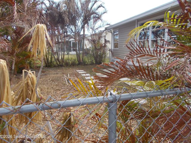 932 Cashew Circle W, Barefoot Bay, FL 32976