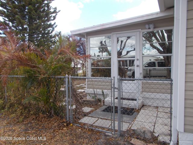 932 Cashew Circle W, Barefoot Bay, FL 32976