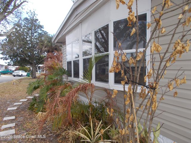 932 Cashew Circle W, Barefoot Bay, FL 32976