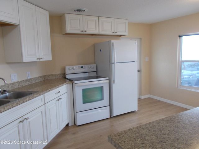 932 Cashew Circle W, Barefoot Bay, FL 32976