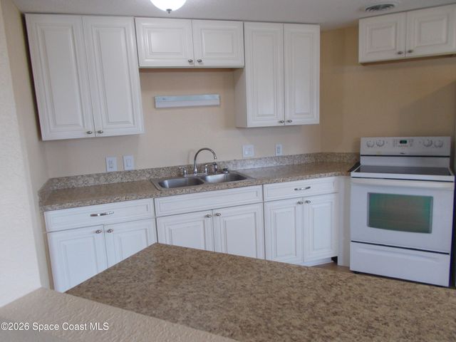 932 Cashew Circle W, Barefoot Bay, FL 32976