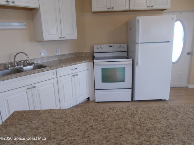 932 Cashew Circle W, Barefoot Bay, FL 32976