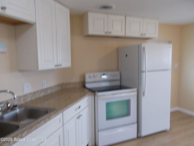 932 Cashew Circle W, Barefoot Bay, FL 32976