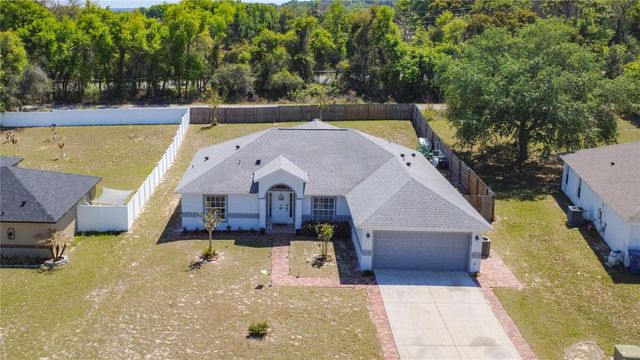 1212 DEMOISELLE STREET, Groveland, FL 34736