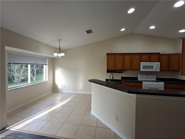 135 Greenbriar BLVD, Lehigh Acres, FL 33972