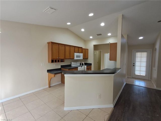 135 Greenbriar BLVD, Lehigh Acres, FL 33972