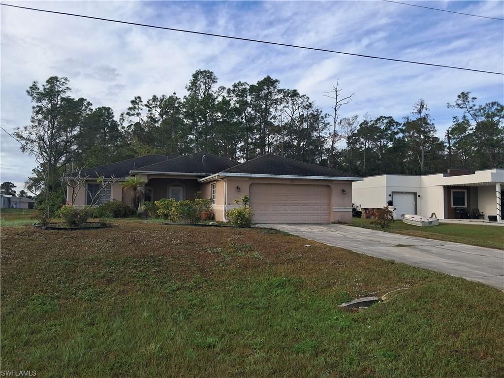 135 Greenbriar BLVD, Lehigh Acres, FL 33972