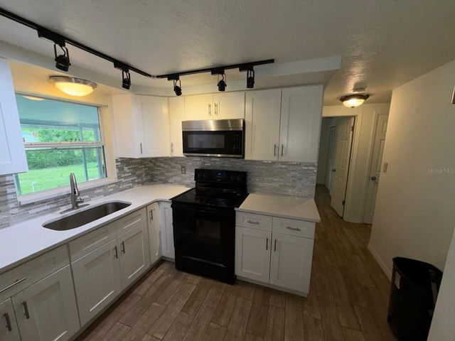 1650 BOLD LANE, Holiday, FL 34691