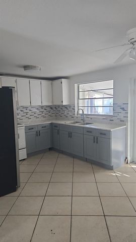 7914 WOODGROVE CIRCLE, Tampa, FL 33615