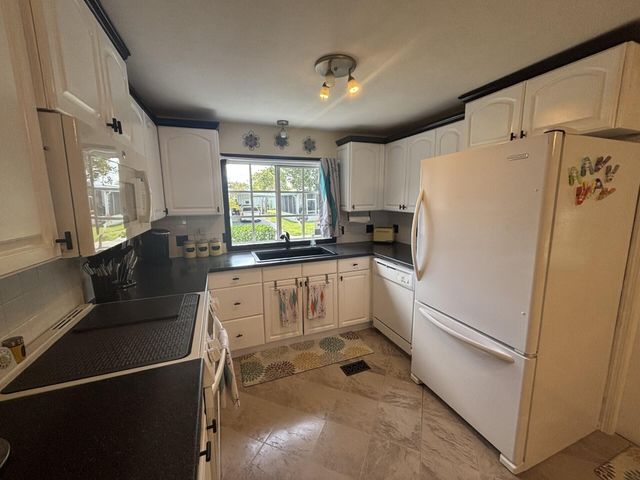 1813 Sabel Drive, Deerfield Beach, FL 33442