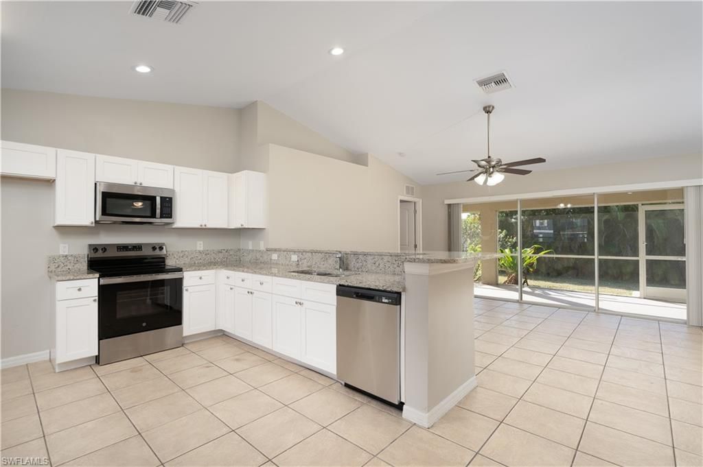 Image 3 of property listing at 1142 NW 27th PL, Cape Coral, FL 33993