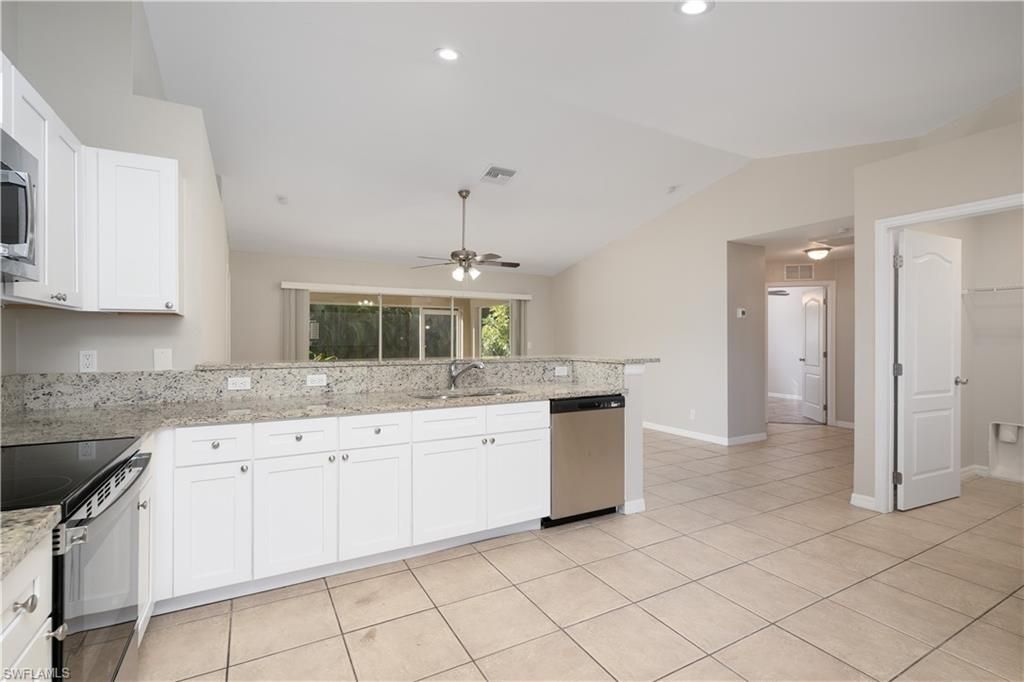 Image 5 of property listing at 1142 NW 27th PL, Cape Coral, FL 33993