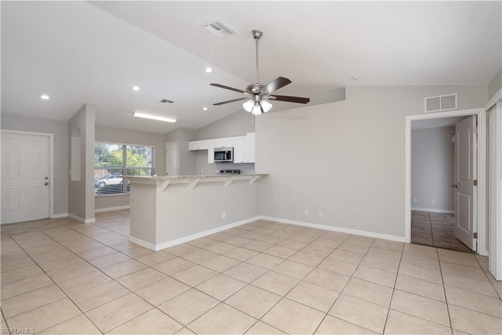 Image 7 of property listing at 1142 NW 27th PL, Cape Coral, FL 33993