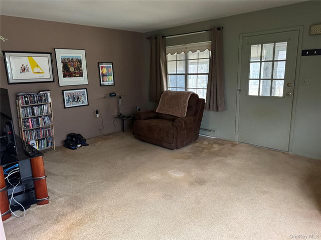 120 Exmore Court A, Ridge, NY 11961