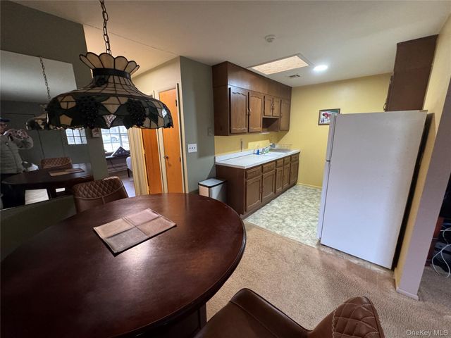 120 Exmore Court A, Ridge, NY 11961