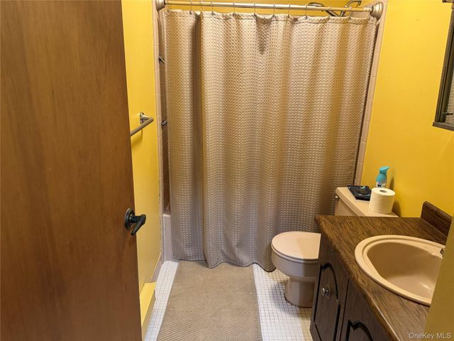 120 Exmore Court A, Ridge, NY 11961