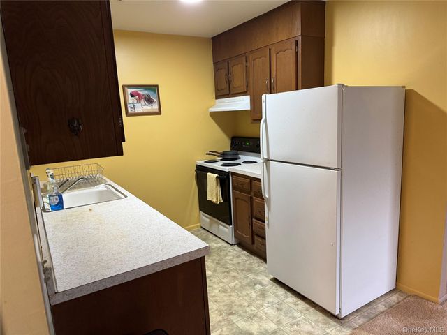 120 Exmore Court A, Ridge, NY 11961