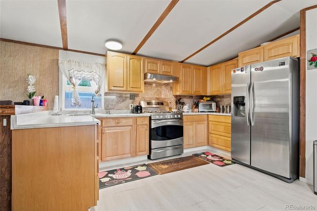 422 Willow Drive, Brighton, CO 80603