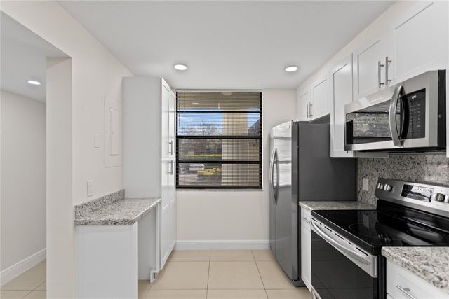 1719 Whitehall Drive 104, Davie, FL 33324