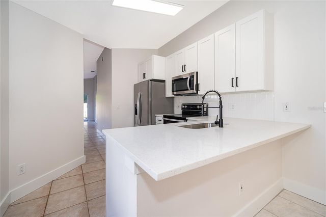 10049 CYPRESS MEADOWS LANE, Orlando, FL 32825