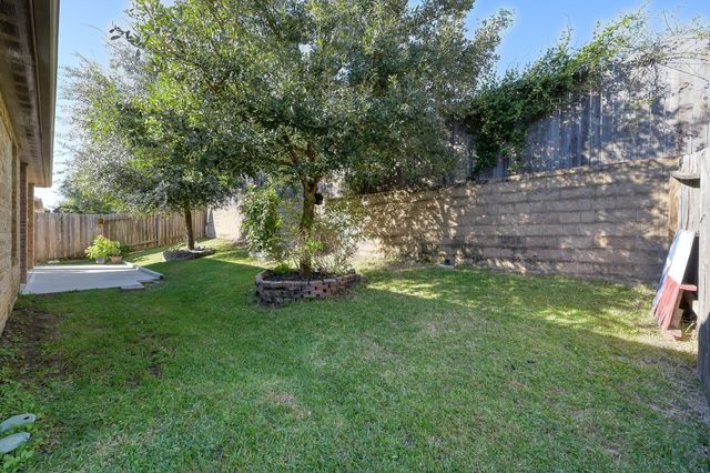 7329 Masquerade Lane, Conroe, TX 77304