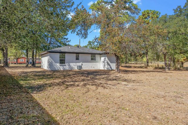 13 Merlin Spur, Huntsville, TX 77320