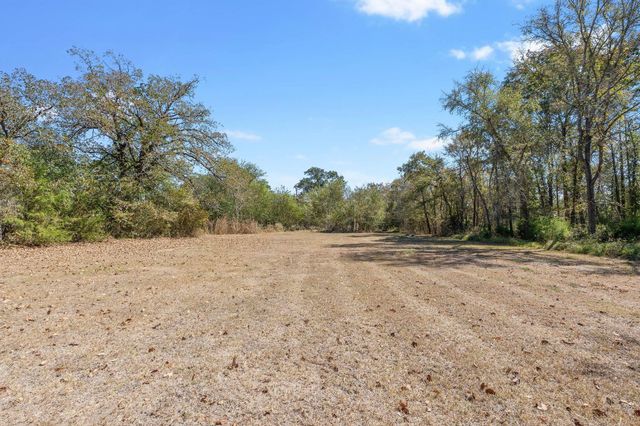 13 Merlin Spur, Huntsville, TX 77320