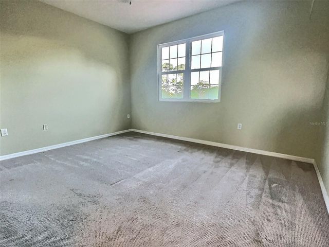 4751 TRAVINI CIRCLE 4-105, Sarasota, FL 34235