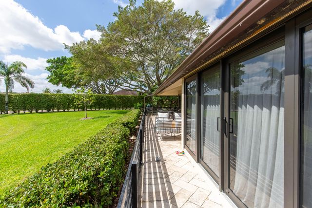 11669 Wimbledon Circle, Wellington, FL 33414