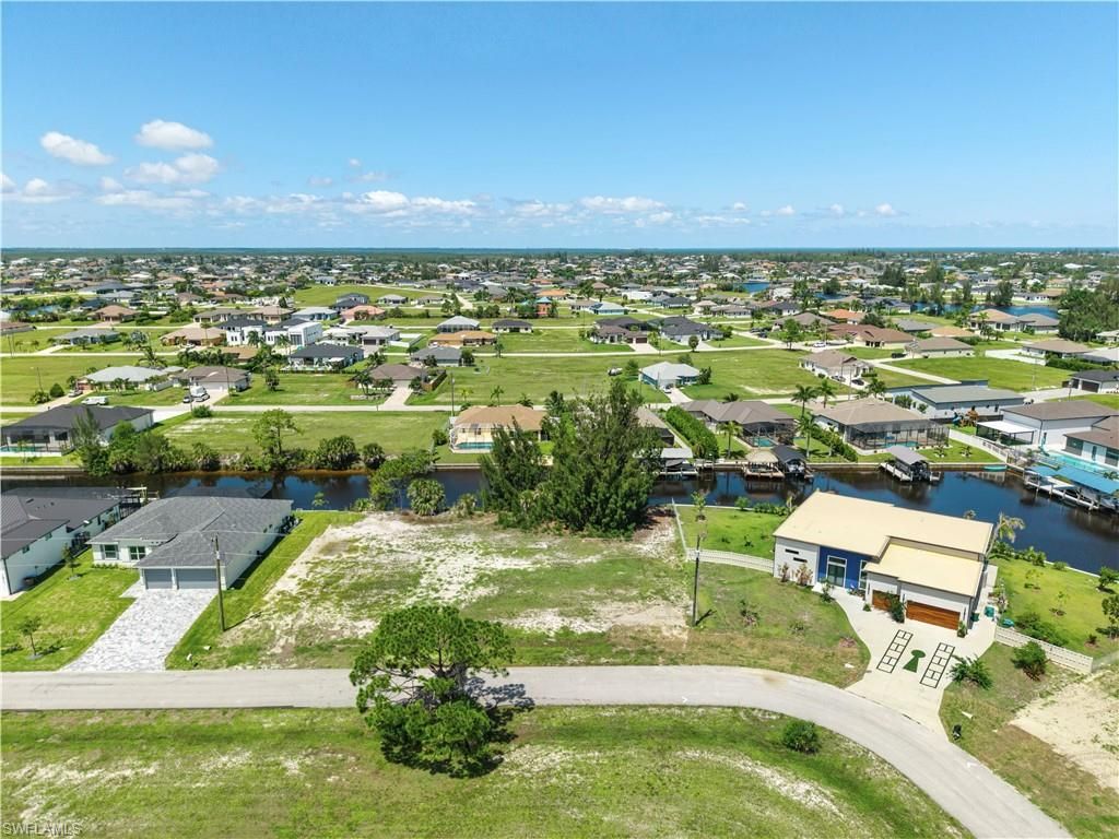 2022 NW 32nd PL, CAPE CORAL, FL 33993 — photo 4