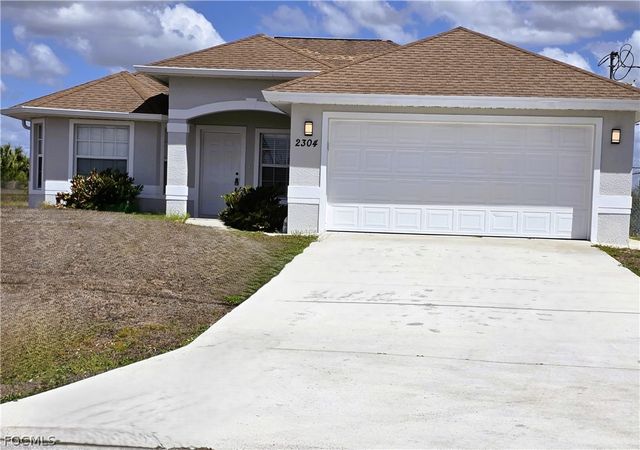 2304 Christopher AVE N, Lehigh Acres, FL 33971